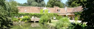 Photo de Le Moulin de Sainte Croix - Gîte de la Roue