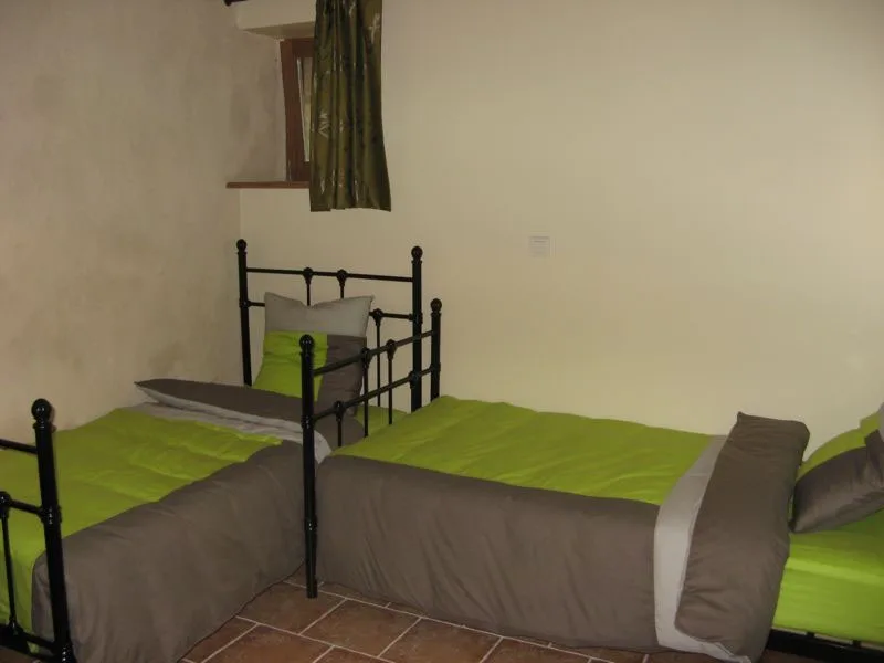 Suite familiale spacieuse avec lit double et chambre séparée