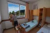 Chambre avec lits superposés pour l'accueil de groupe dans la Maison de l'Aiglette